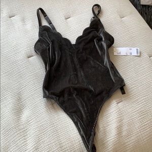 Never worn new with tags velvet body suit